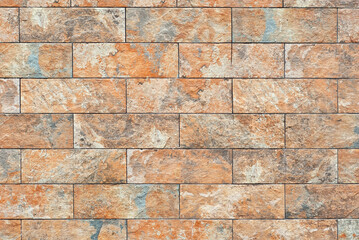Naklejka premium Plaster on a yellow wall. Concrete wall texture close up.