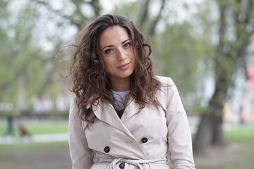 Portrait of a young beautiful girl in the park