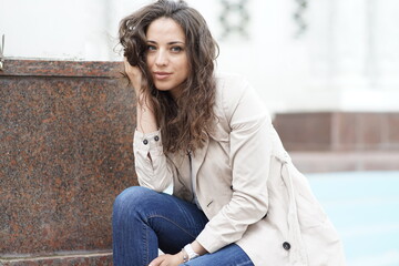 Portrait of a young beautiful girl in the park