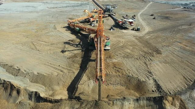 Dragline Excavator in Open Pit Lignite Coal Mine Drone Aerial View. Heavy Mining Machinery and Industry
