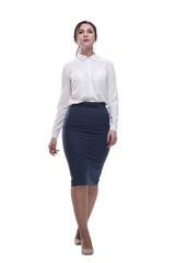Fototapeta premium businesswoman in a white blouse and black skirt striding forward.