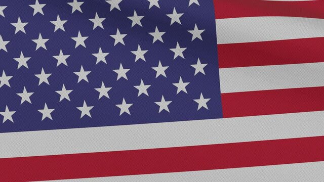 Close-up of the waving flag of the United States with stars and stripes