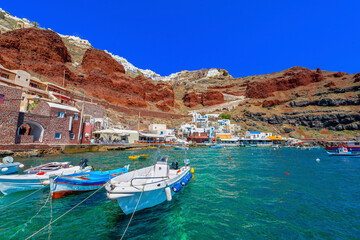 Greece Santorini island in Cyclades, Ammoudi village with fishing boats - 429379008