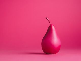 Pink painted pear isolated on vibrant pink background. Contemporary vegetarian fruit diet concept. Minimal summer food pop art banner.