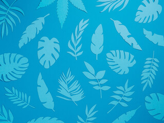 Summer tropical pattern with blue palm leaves against matching monochrome background. Minimal natural summer concept. Exotic texture wallpaper. Flat lay, top view.