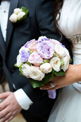 Wedding bouquet in brides hands