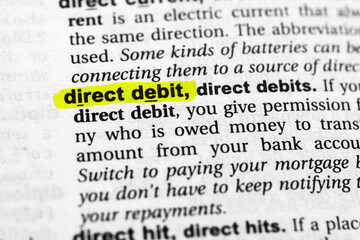 Highlighted word direct debit concept and meaning