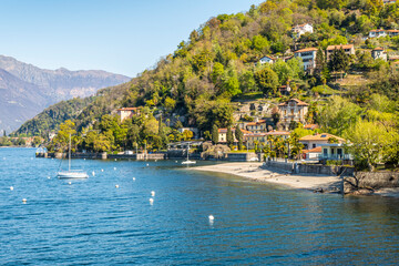 Fototapeta premium The Colmegna coast with its beach and its villas