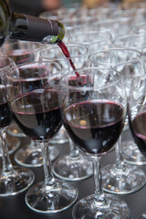 Vine pouring into glasses