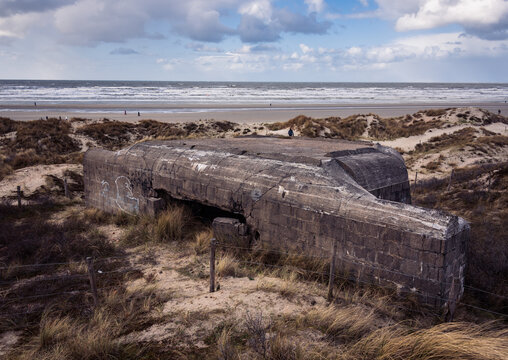Koksijde, West Flanders, Belgium - 04 06 2021: View of the German WWII Waldersee resistance nest from the Second World War, which was part of the Atlantic Wall, in the sand dunes by the beach