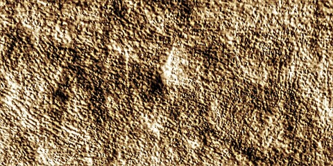 yellow dirty wall with texture and small stones