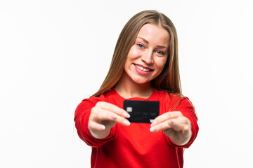 Happy young woman hold credit card isolated on white background