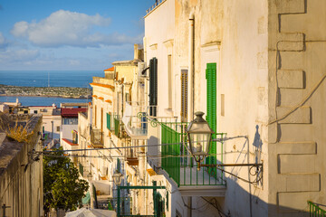 Picturesque facades and balconies in the old town of Vieste, Gargano, Italy