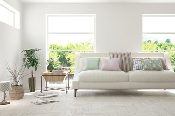 White living room with sofa and summer landscape in window. Scandinavian interior design. 3D illustration
