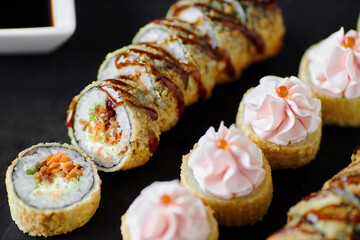 sushi rolls tempura in a beautiful setting