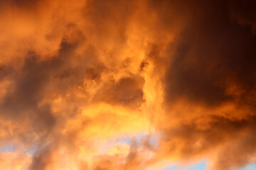 Fototapeta na wymiar Clouds illuminated at sunrise.