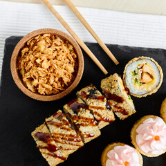 sushi rolls tempura in a beautiful setting