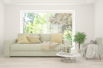 White living room with sofa and summer landscape in window. Scandinavian interior design. 3D illustration