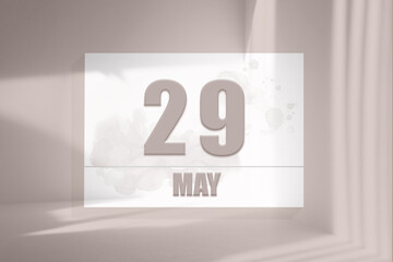 may 29. 29th day of the month, calendar date. White sheet of paper with numbers on minimalistic pink background with window shadows.Spring month, day of the year concept