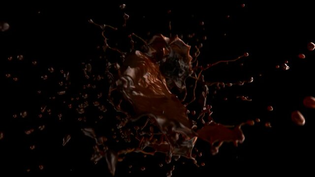 Amazing beautiful and mesmerizing fountain. The force of surface tension creates amazing droplets and liquid surfaces. Caramel, chocolate, water and orange juice. With alpha channel, ready to compos.