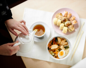 Japanese lunch of ramen, sushi and fresh tea