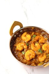 Indian food- Prawns masala or shrimp curry. Also known as Kolambi che Kalvan in Marathi. Chingri fry. Maharashtrian Prawns curry. Copy space.