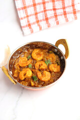 Indian food- Prawns masala or shrimp curry. Also known as Kolambi che Kalvan in Marathi. Chingri fry. Maharashtrian Prawns curry. Copy space.