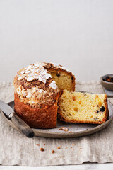 Panettone, italian christmas cake. Panettone with raisins and chocolate.