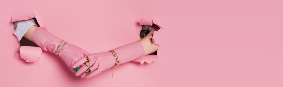 Cropped View Of Hands Of Woman In Gloves And Accessories Near Pink Background With Holes, Banner