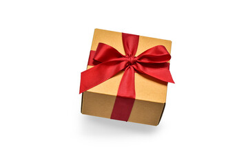 box with a red ribbon on a white background with a shadow.  presentation of the gift. present in beige packaging.  