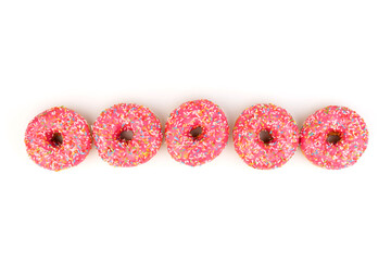 Fresh made Donuts isolated on white background. Doughnuts are traditional sweet pastries. Copy space for text.