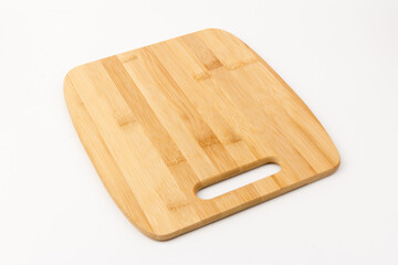 Top view high quality wood cutting board, brown wood. Chopping boards made from natural bamboo. Isolated image kitchen utensil on white background.