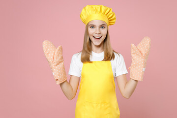 Teen girl chef cook confectioner baker housewife mother's helper in yellow apron white t-shirt...