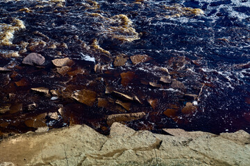 Fototapeta premium River, river stone bank. Natural riverside outdoor background, wallpaper.