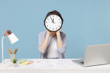 Young employee business woman 20s wear casual shirt sit work at white office desk with pc laptop...