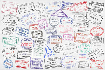 Fullframe close-up on worldwide passport stamps.