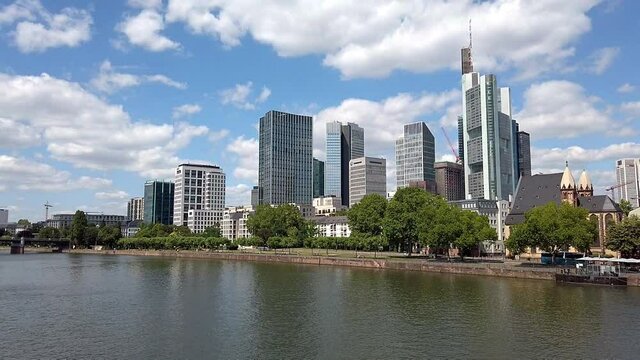 View from Eiserner Steg / The Iron Bridge on Main River to the business centre of the city, July 2019