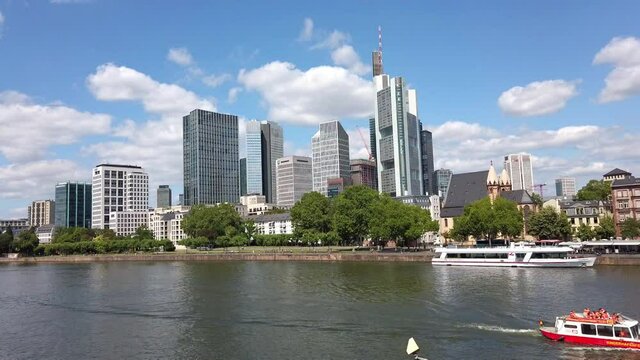 View from Eiserner Steg / The Iron Bridge on Main River to the business centre of the city, July 2019