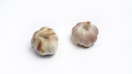 Two garlic on white background