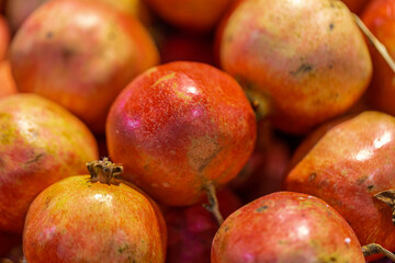 Delicious looking red pomegranate juicy tasty Fruit