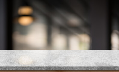 Empty white marble stone table top and blur interior cafe and restaurant.