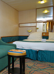 Comfortable double bed with duvet in luxurious oceanview or ocean view or outside or exterior...