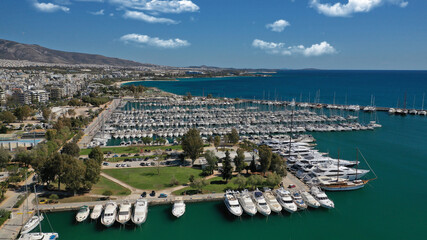 Aerial drone photo of beautiful Marina of Alimos with many luxury yachts and sail boats anchored,...