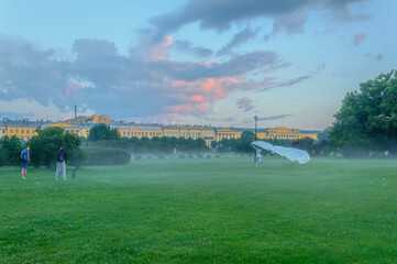 Staged shooting on the Champ de Mars on a foggy summer morning.