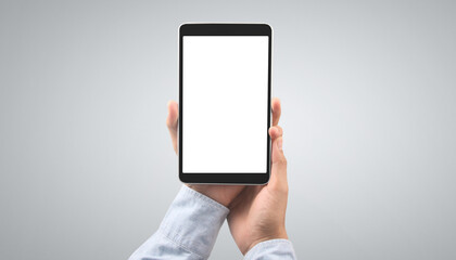 Hands holding tablet touch computer gadget