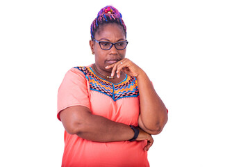 pensive adult woman crossing down with raised hand under chin.