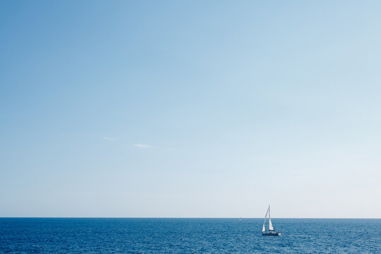 Sailing Ship On The High Seas Against The Blue Sky