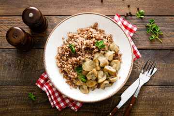 Mushroom buckwheat porridge bowl with fresh parsley