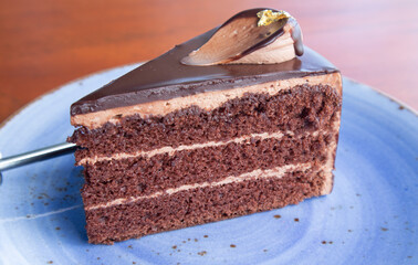 Chocolate cake on a wooden table