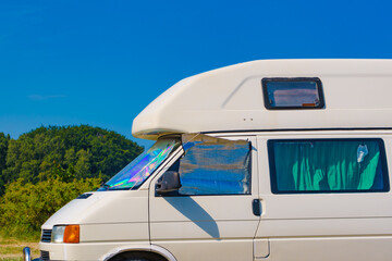 Camper van camping on nature